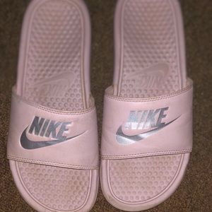 Size 8 Nike slides in light pink